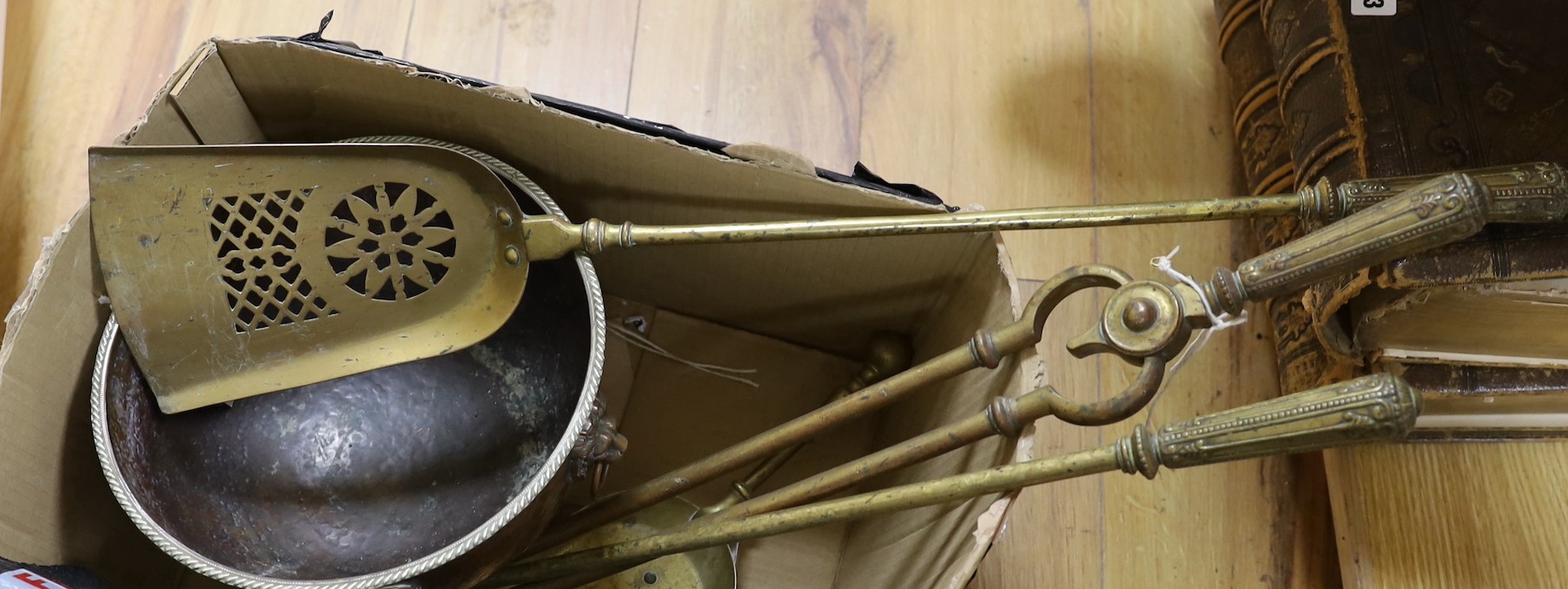 A set of three Georgian gilt bronze fire implements, a similar brass shovel and sundries